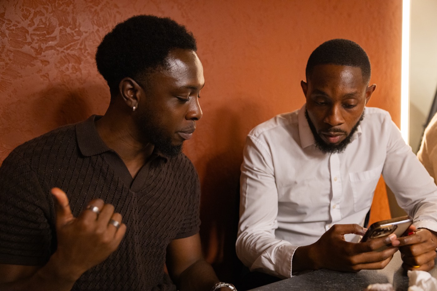 Two founders exchanging details
